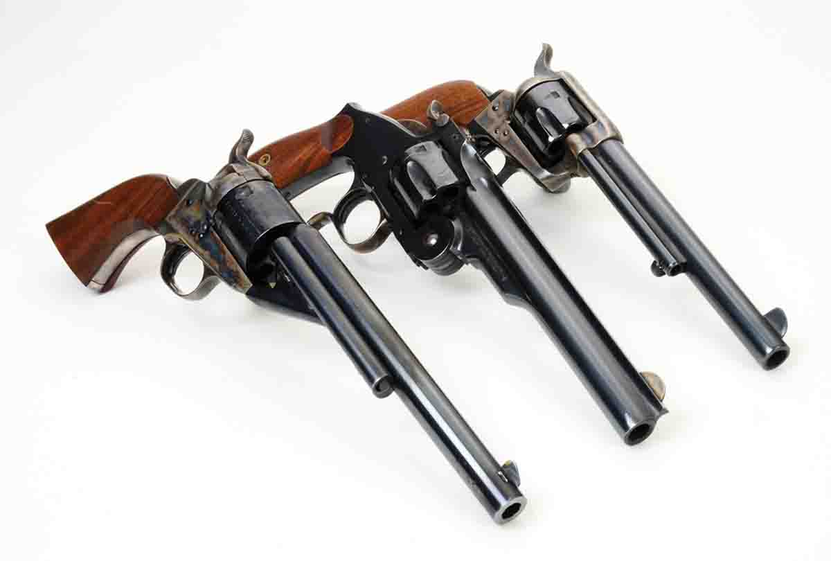These modern revolvers are nearly perfect copies of 1870s revolvers. They include (left to right): a Colt Model 1861 “Conversion” .38 LC, Navy Arms replica of the Smith & Wesson 3rd Model .44 Russian, and a Colt SAA .45.
